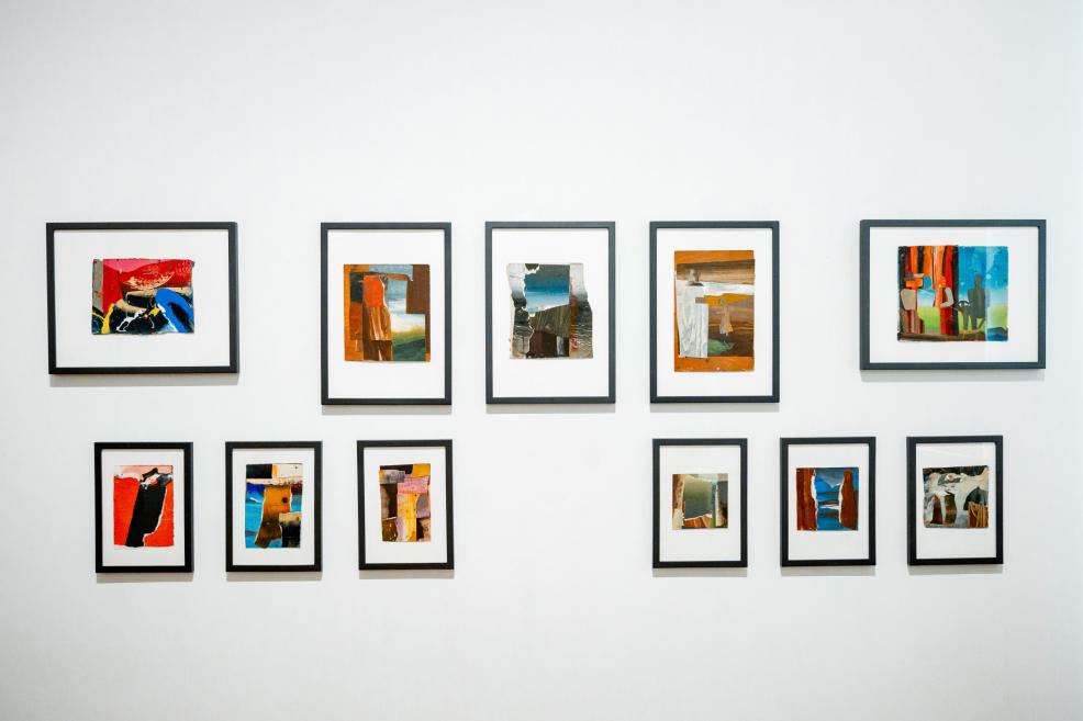 A series of ten small colorful collages in frames is displayed on the wall in two rows.