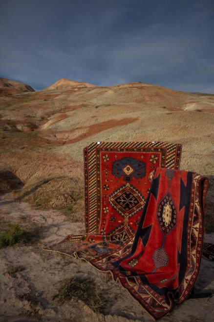 Woven carpets exposed in nature.