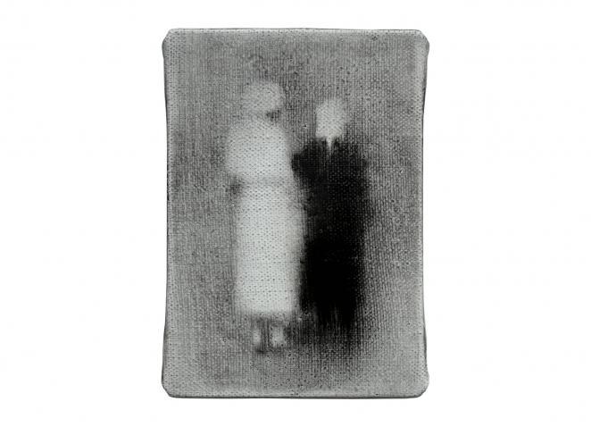 In a small grey-toned image, two blurred human figures stand side by side, one lighter and one darker, creating a vague, ghostlike effect.