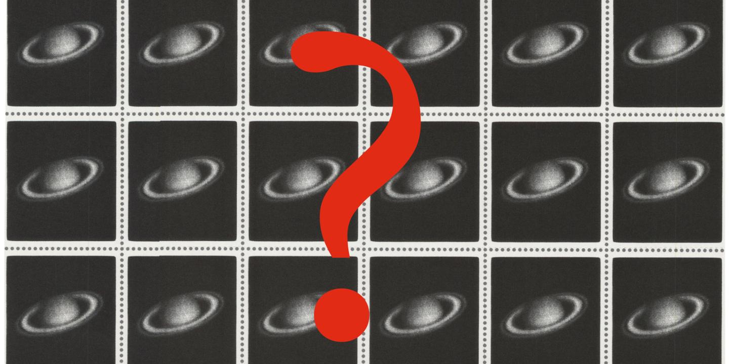 Black-and-white printed grid composition with repeated images of Saturn, overlaid by a large red question mark.