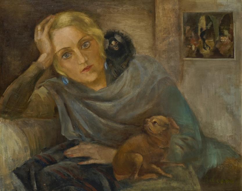 A portrait of a blonde woman resting her head on her hand with a small monkey on her shoulder, with a small painting visible in the background.