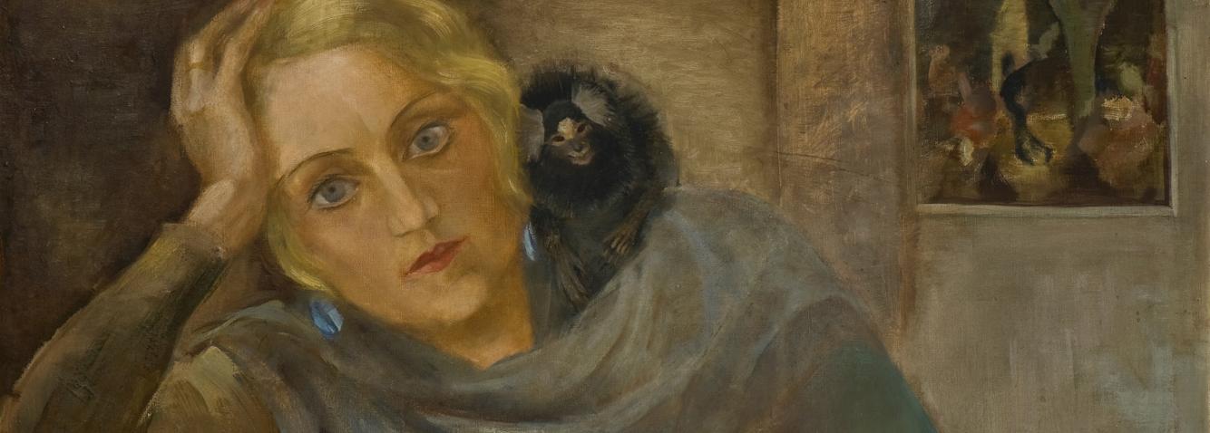 A portrait of a blonde woman resting her head on her hand with a small monkey on her shoulder, with a small painting visible in the background.