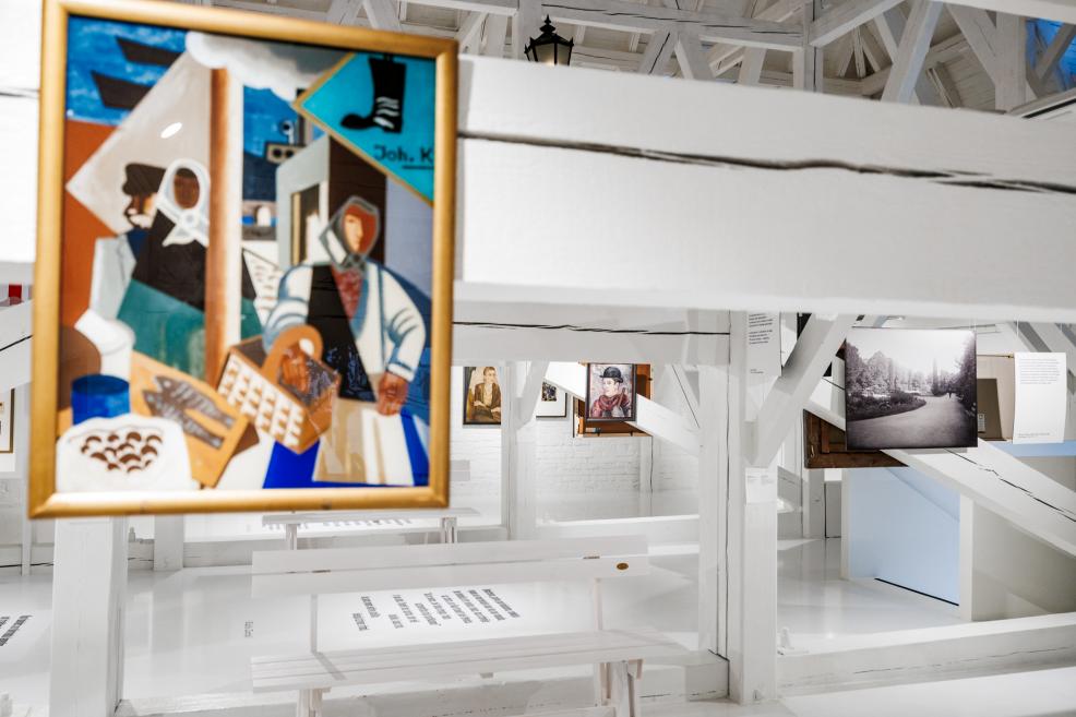 Painting displayed in an exhibition space, shown in a bright gallery interior with other artworks visible in the background.