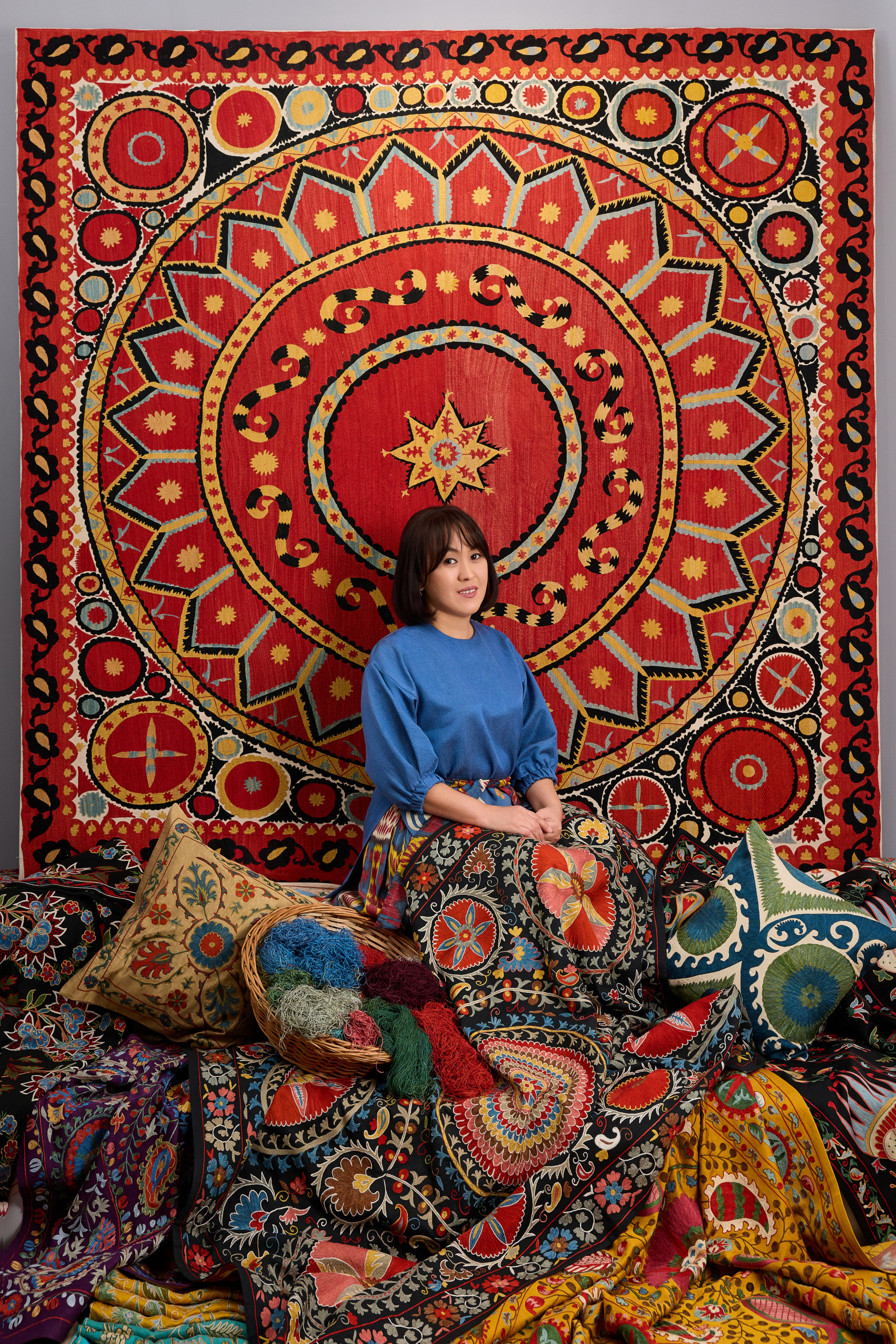 Embroidery artist with fabrics