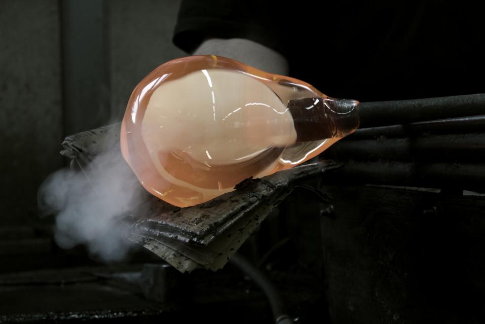 The process of creating a glass object.