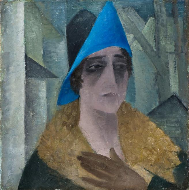 Aleksandra Beļcova. Self-portrait in a Hat with a Blue Brim. 1920-1921. Oil on canvas. 44,5 x 43 cm. Romans Suta and Aleksandra Beļcova Museum. Photo: Normunds Brasliņ&scaron;