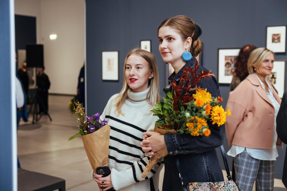 Young women with flowers