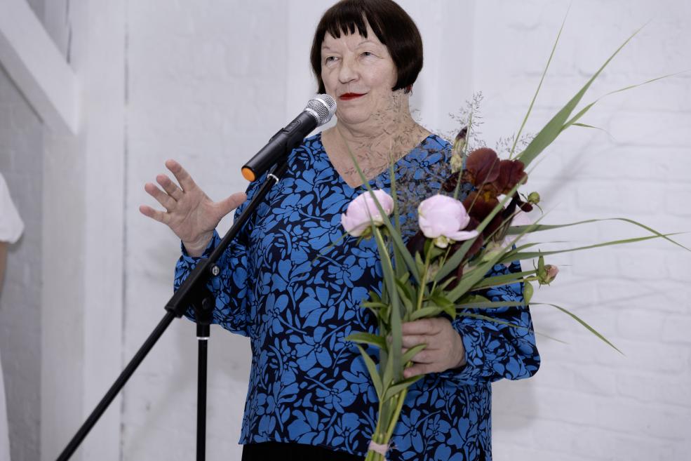 The director of the museum at the opening of the exhibition.