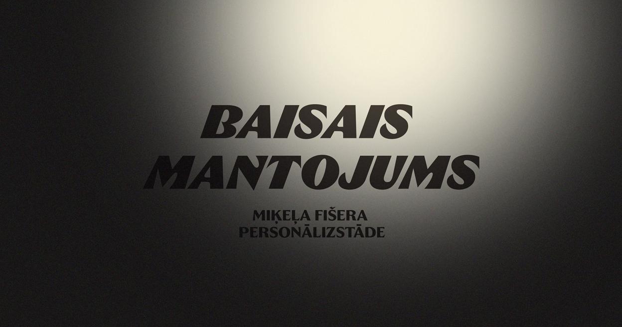Tumšs uzraksts uz gaiša fona ar tekstu Baisais mantojums un zem tā Mikela Fišera personālizstāde.