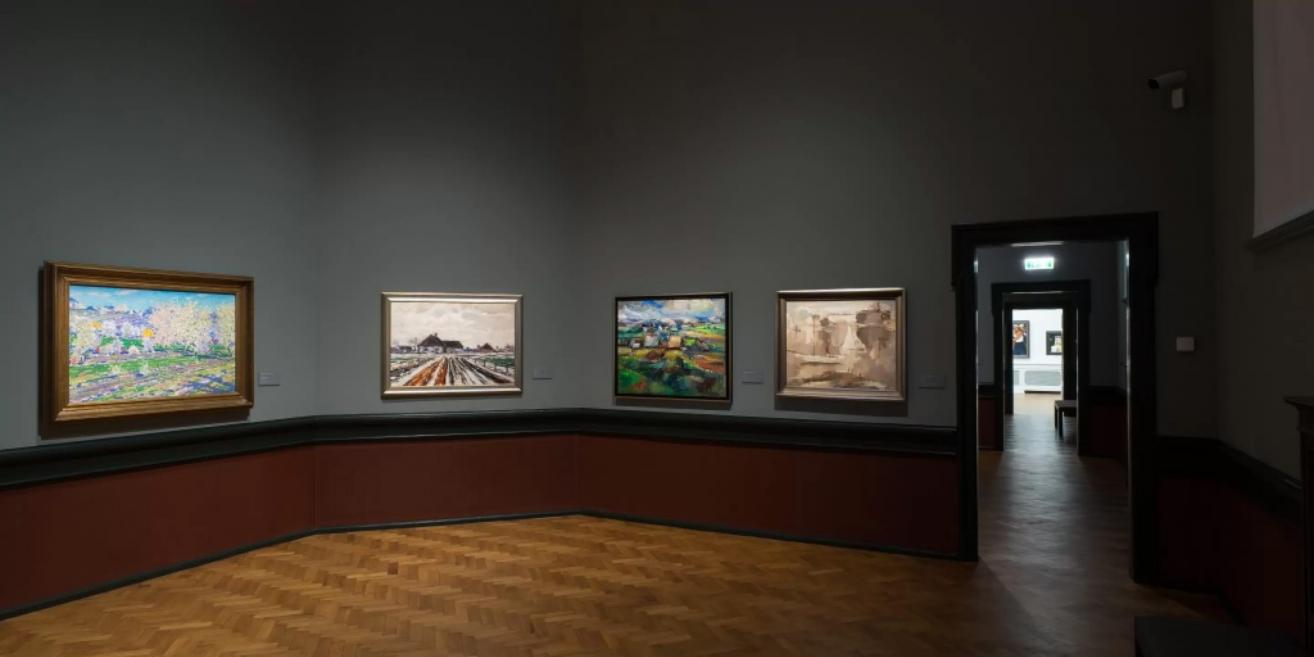 Gallery of the Latvian National Museum of Art displaying landscape paintings from the first half of the 20th century.