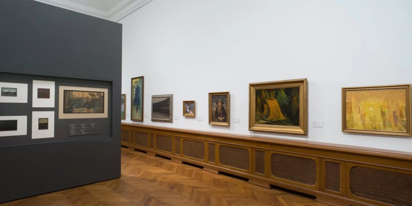 Exhibition hall of the Latvian National Museum of Art featuring early 20th-century Latvian painting.