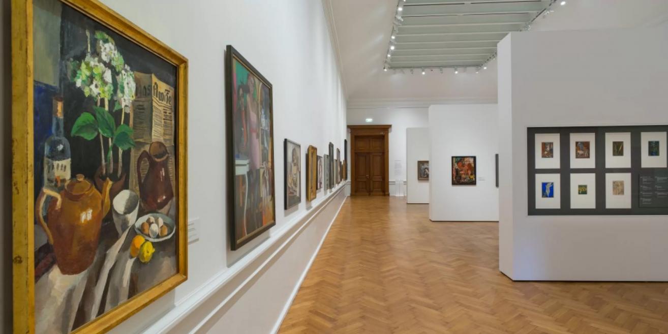 Hall of the Latvian National Museum of Art showcasing early and interwar 20th-century painting.