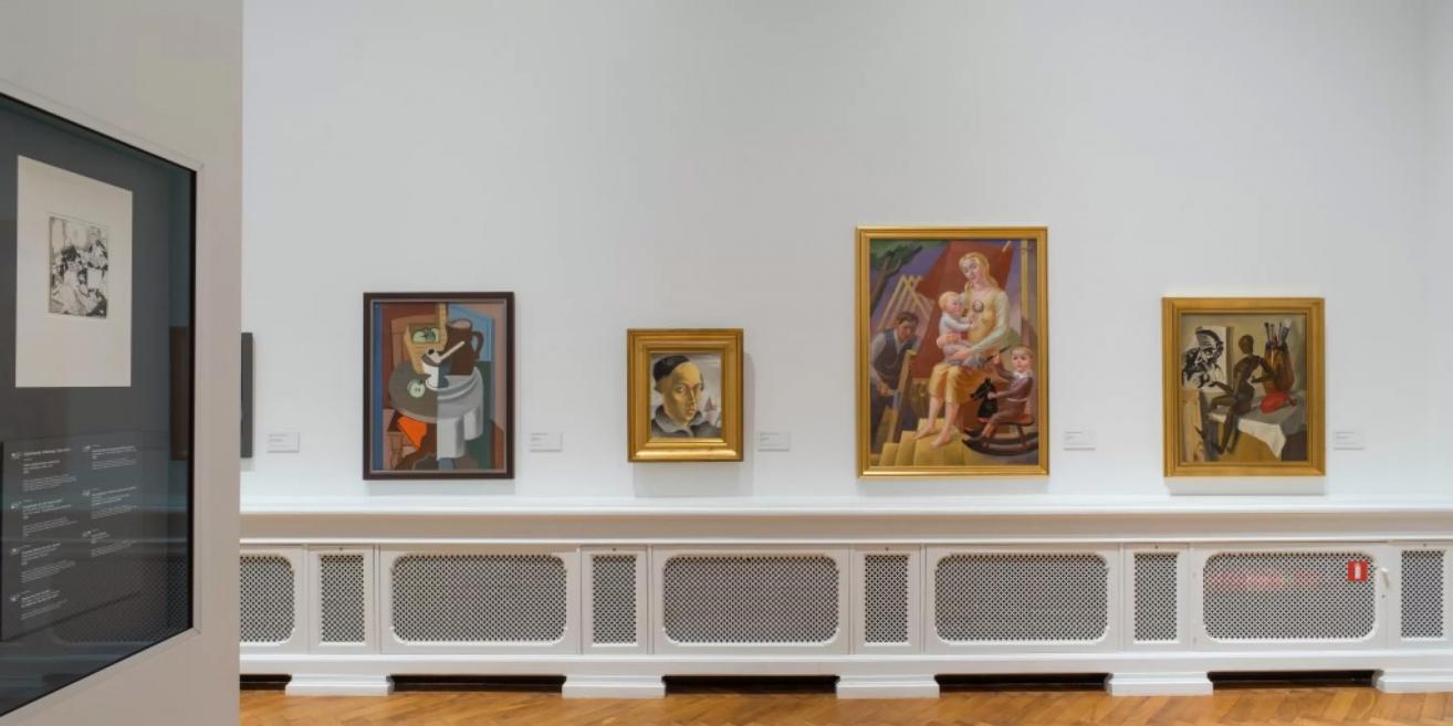 Exhibition at the Latvian National Museum of Art displaying Latvian artists’ portraits and figurative compositions.