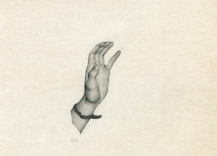Against a light background, a detailed drawing shows a raised human hand with a bracelet around the wrist.
