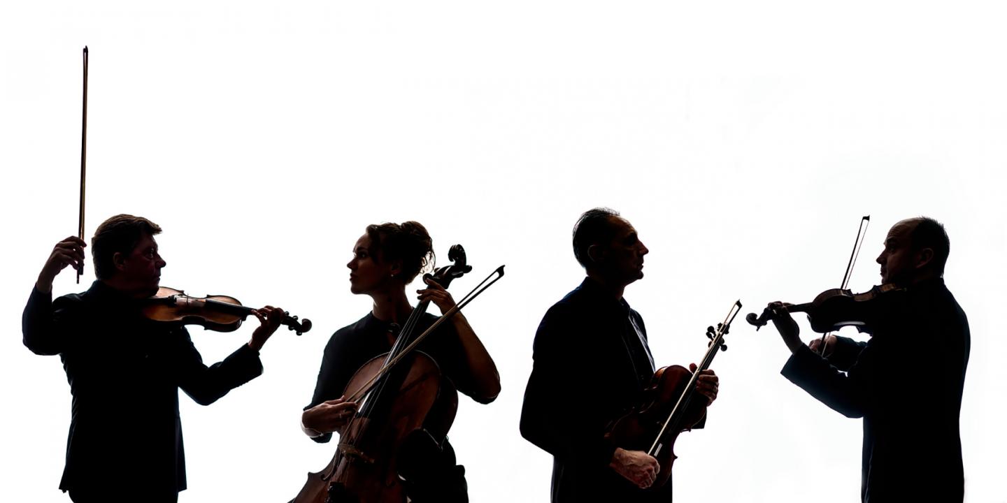Four musicians in silhouette play string quartet instruments – two violins, a viola, and a cello.