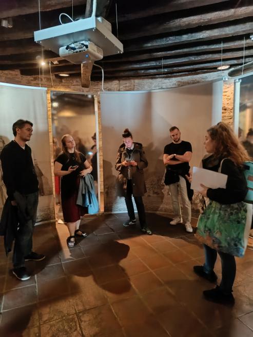 “Talking Heads” project participants exploring an exhibition during a museum visit.