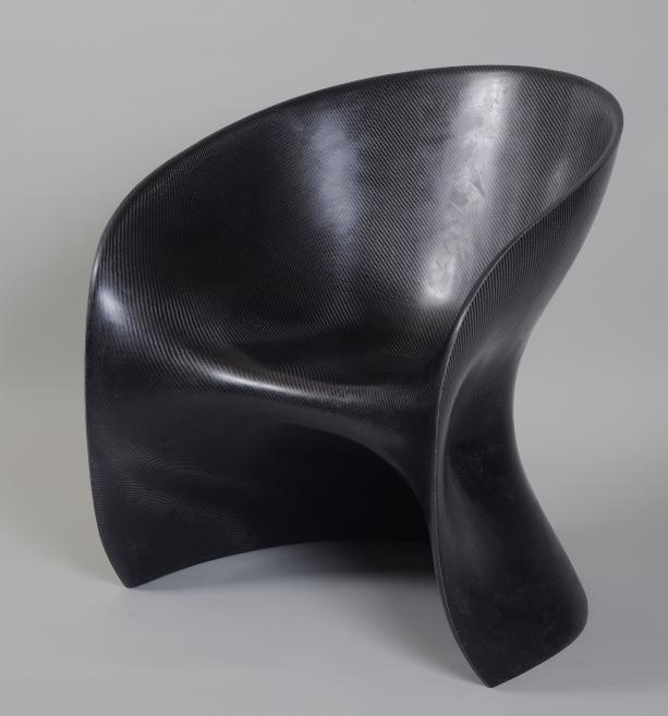 Christian Ghion (1958). Armchair. 2013. Carbon fibre shell, epoxy resin, glossy varnish. Mobilier national collection. Photo: Isabelle Bideau