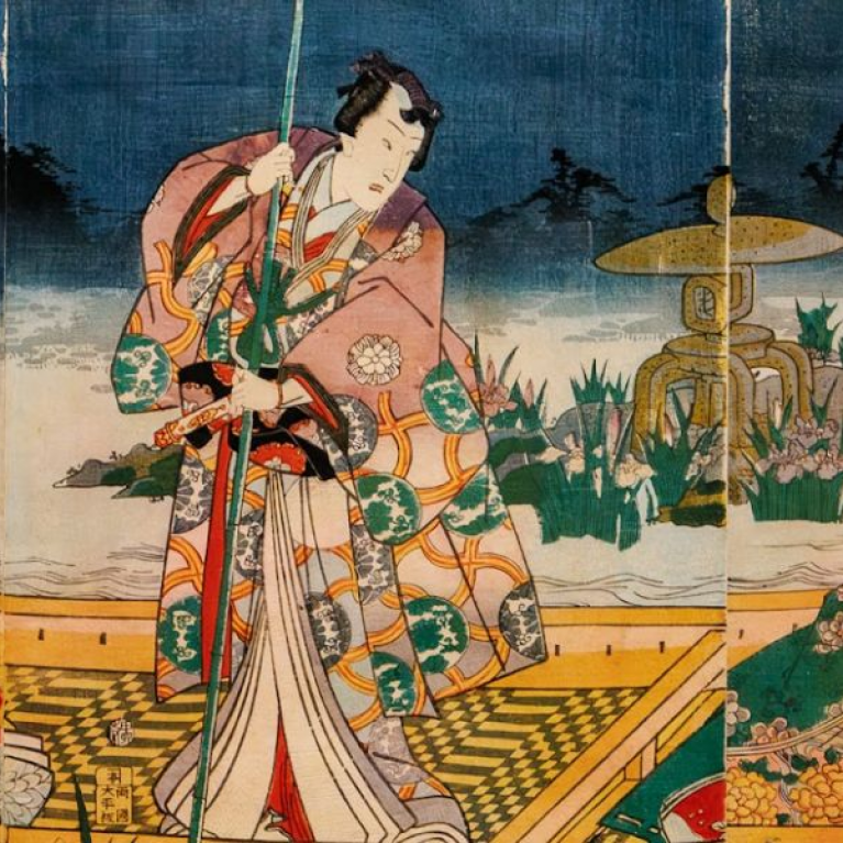 A colorful Japanese woodblock print depicting three figures in traditional attire in a boat against a waterside landscape background.