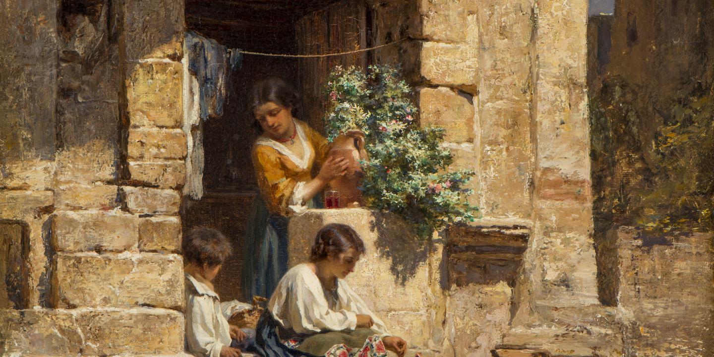 Sieviete un divi bērni sēž un darbojas saules apgaismotā itāļu pagalmiņā pie akmens sienas ar ziediem.