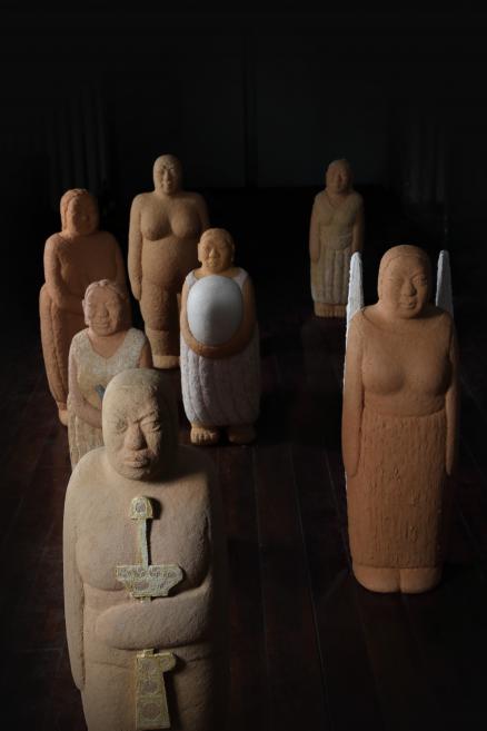 Clay statues in human form.